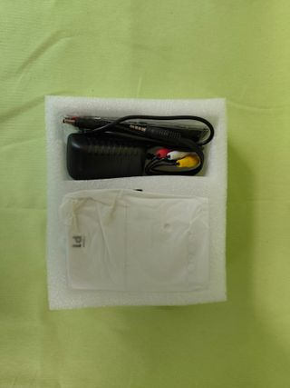 Mini proyector LED portátil F1 con mando - Blanco