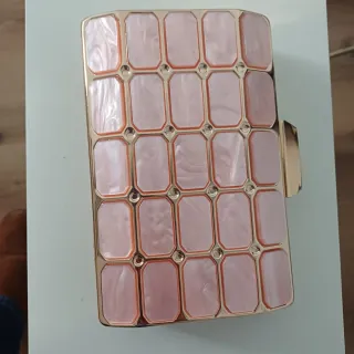 Bolso de fiesta rosa y dorado