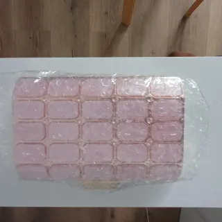 Bolso de fiesta rosa y dorado