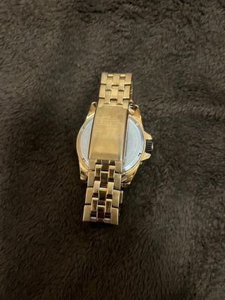Reloj lotus dorado