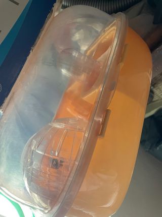 Jaula para hámster naranja y transparente