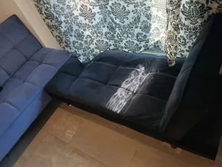 Sofá cama azul y negro