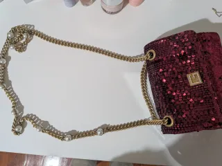 Bolso Guess lentejuelas rojo y dorado