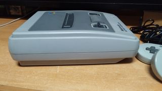 Super Famicom con 2 mandos y juego
