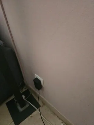 Butaca reclinable gris tela