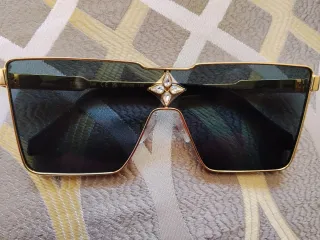 Gafas de sol Louis Vuitton azules y doradas