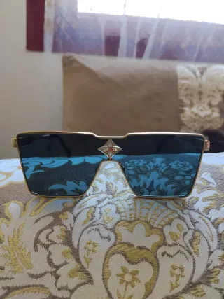 Gafas de sol Louis Vuitton azules y doradas
