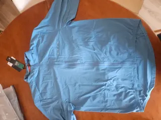 Cortavientos unisex Nyasa Born Living Yoga Azul