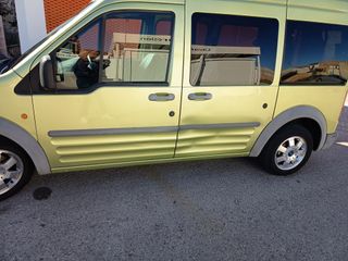Ford Transit Connect 2006 con plataforma silla rue