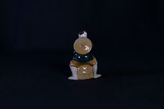 Figurita pescador cerámica