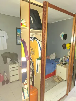 Armario grande 3 puertas correderas.