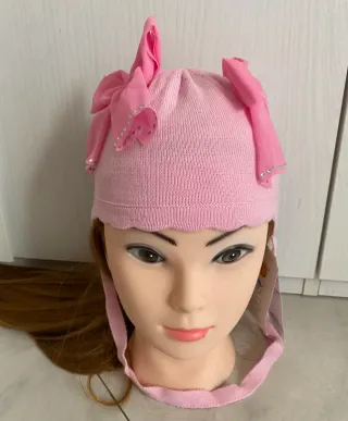 Cappellino rosa  Barbaras 3/12 mesi con fiocchi
