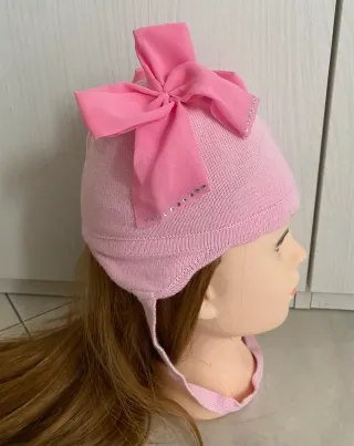 Cappellino rosa  Barbaras 3/12 mesi con fiocchi