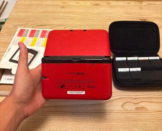Nintendo 3DS XL Roja, Pokemón Zafiro Alfa y más.
