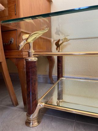 Mesa centro cristal y metal dorado