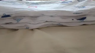 Protector y ropa cuna