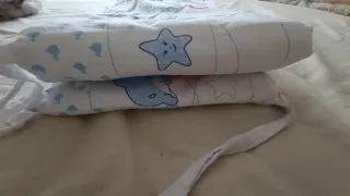 Protector y ropa cuna