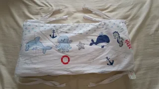 Protector y ropa cuna