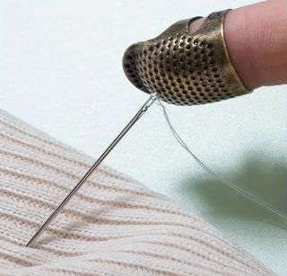 Dedal de costura para proteger dedo y uña