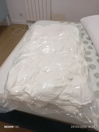 Colchón, almohada y edredón