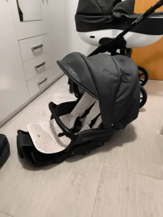 Carro de bebé con silleta gris