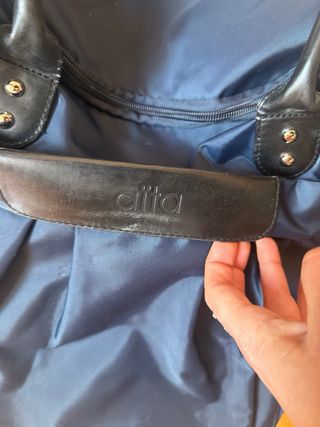 Maleta de cabina azul marca Aïta