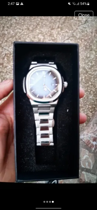 Orologio  blu e argento