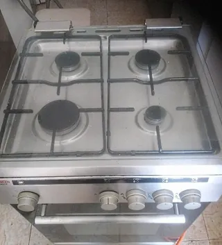 Cocina gas 4 fogones y horno