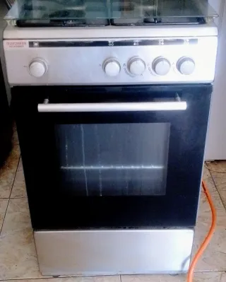 Cocina gas 4 fogones y horno