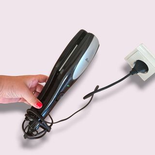 Placa alisadora Nevir preta e prateada