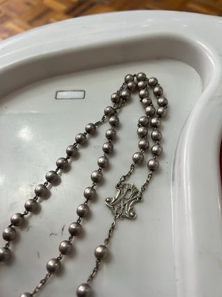 Rosario de plata de ley