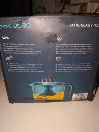 Exprimidor eléctrico azul