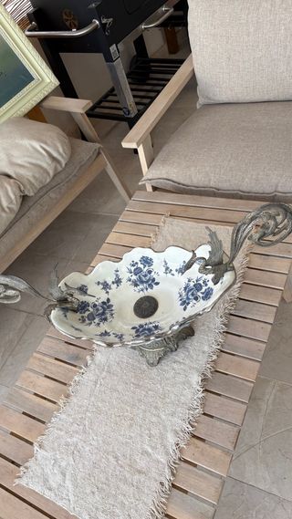 Centro de mesa decorativo azul y plateado