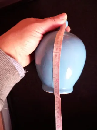 Salvadanaio azzurro in terracotta