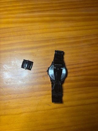 Reloj de Marca Negro