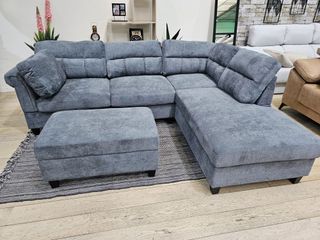 Sofá rinconera gris 260cm + puff