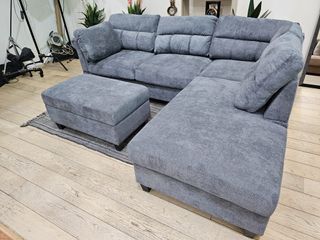 Sofá rinconera gris 260cm + puff