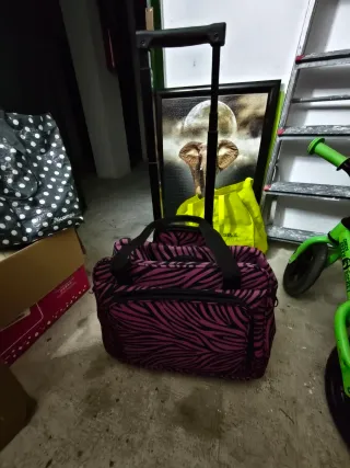 Bolsa de viaje con ruedas rosa y negra