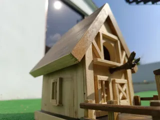 Casita para pájaros de madera
