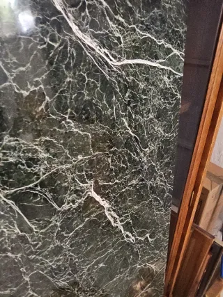 Pareja ménsulas mas marmol verde veteado