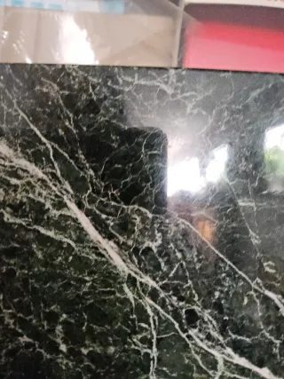 Pareja ménsulas mas marmol verde veteado