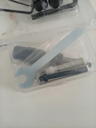 Reposaflechas y Botón Negro