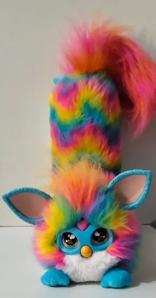 DJ Furby Rainbow, 2025, Aleman