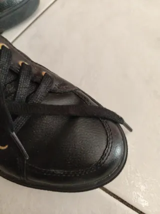 Scarpe Guess nere alte