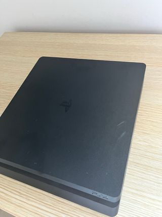 PS4 Slim Negra + Mando + 9 Juegos (GT7,FIFA 23...)