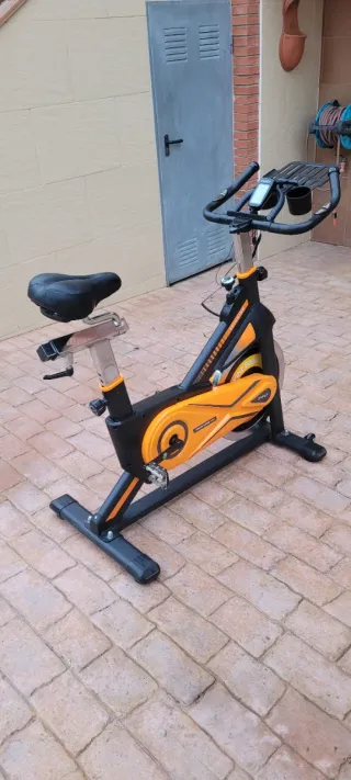 Bicicleta Spinning Naranja y Negra