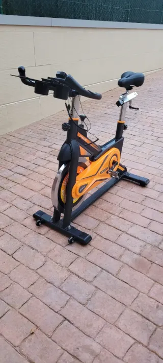 Bicicleta Spinning Naranja y Negra