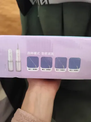 Limpiador bucodental eléctrico Jinchaosheng