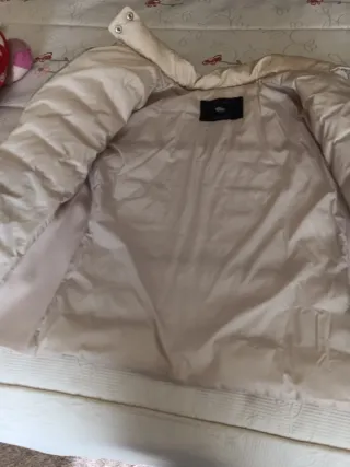 Cazadora fina de plumas