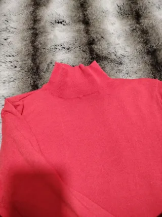 Jersey naranja cuello alto